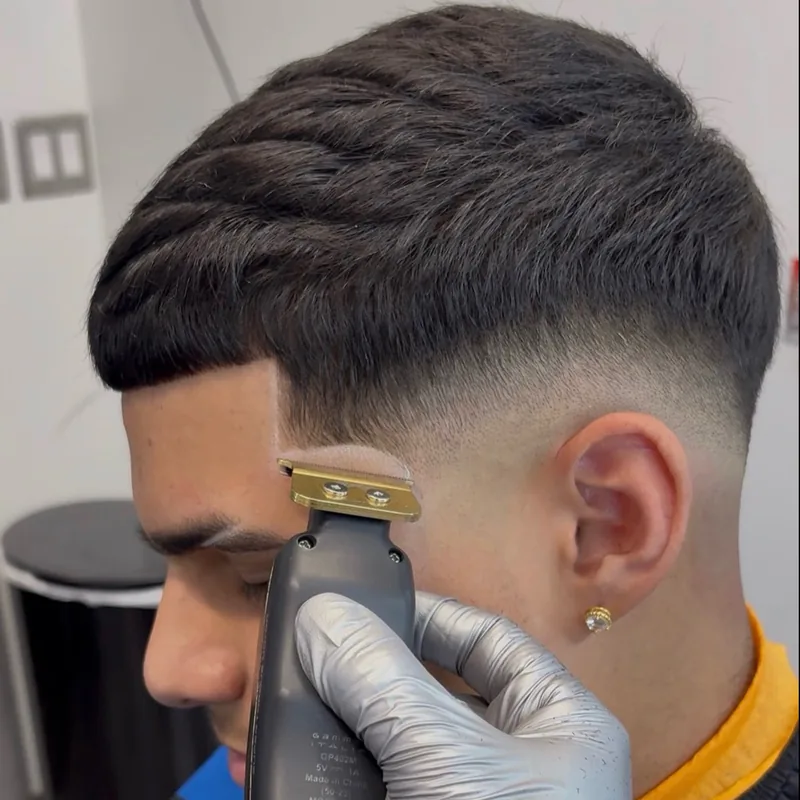 Skin fade in progress by Chris Martinez at The Hause of Fades in Fort Myers