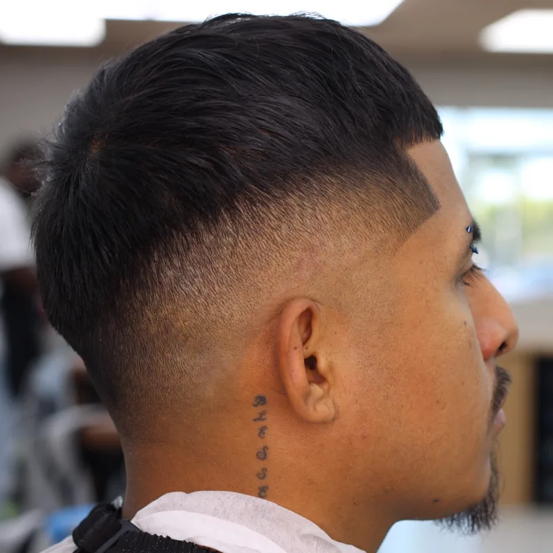Mid fade with a sharp line up by Nataly at The Hause of Fades in Fort Myers